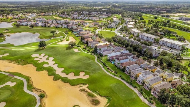 7411 Excitement Dr, Reunion, FL 34747 - aerial perspective of suburban area featuring a nearby body of water and a local golf course