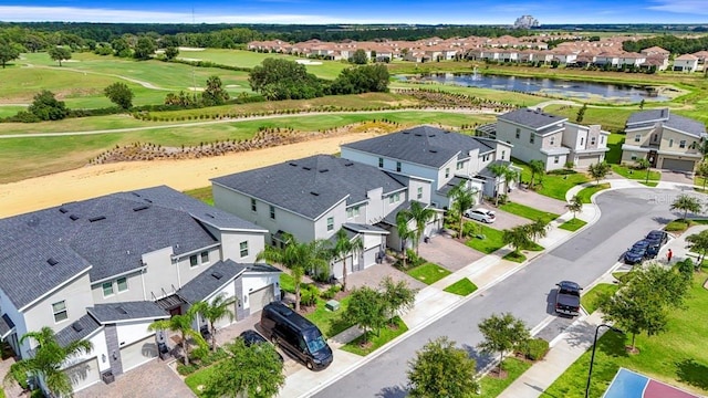 877 Ocean Course Ave, Davenport, FL 33896 - aerial perspective of suburban area featuring a golf club and a large body of water