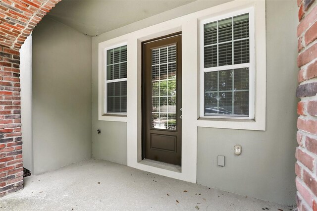 439 Windmill Palm Cir, Altamonte Springs, FL 32701 - view of exterior entry with brick siding and stucco siding