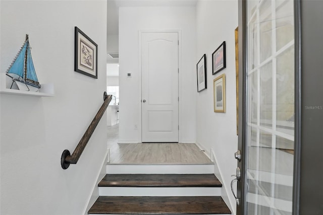 439 Windmill Palm Cir, Altamonte Springs, FL 32701 - stairs with wood finished floors and baseboards