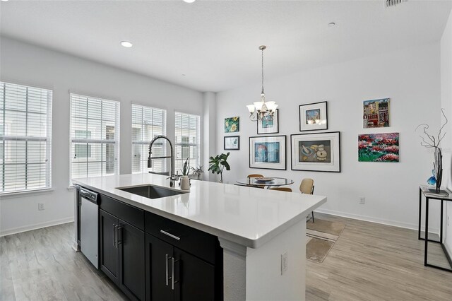 439 Windmill Palm Cir, Altamonte Springs, FL 32701 - kitchen with a sink, dishwasher, dark cabinetry, light countertops, and recessed lighting