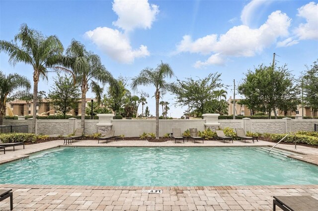 439 Windmill Palm Cir, Altamonte Springs, FL 32701 - community pool featuring a patio