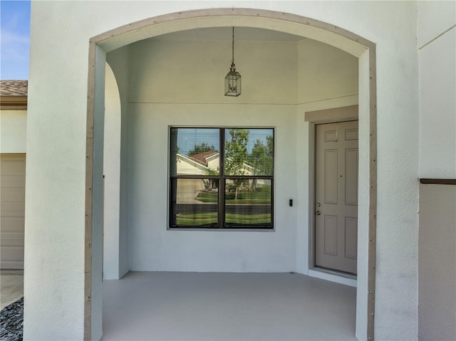 921 Costa Mesa Ln, Kissimmee, FL 34744 - property entrance featuring stucco siding