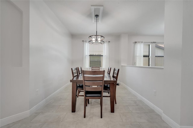 921 Costa Mesa Ln, Kissimmee, FL 34744 - dining space with plenty of natural light, a chandelier, and baseboards
