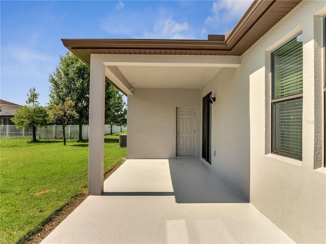 921 Costa Mesa Ln, Kissimmee, FL 34744 - view of patio with central AC unit