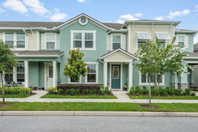10221 Highline Crest St, Orlando, FL 32832 - view of property featuring stucco siding