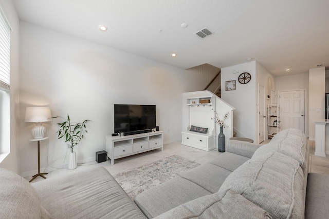 10221 Highline Crest St, Orlando, FL 32832 - living area featuring stairs and recessed lighting