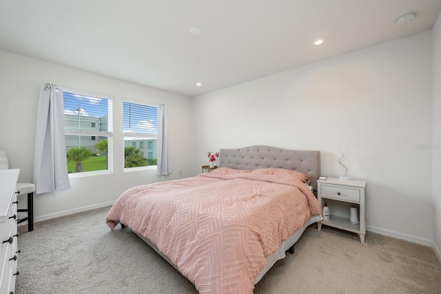 10221 Highline Crest St, Orlando, FL 32832 - bedroom featuring light carpet, baseboards, and recessed lighting