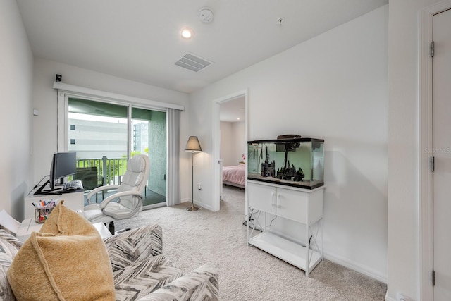 10221 Highline Crest St, Orlando, FL 32832 - carpeted living area with baseboards