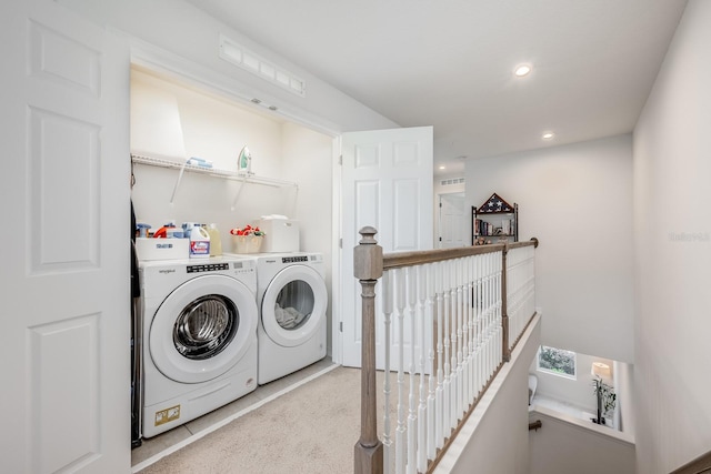 10221 Highline Crest St, Orlando, FL 32832 - washroom with washing machine and dryer, carpet floors, and recessed lighting