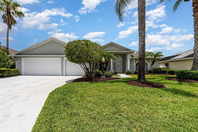 2135 Springwater Ln, Port Orange, FL 32128 - ranch-style house with driveway, a garage, stucco siding, and a front yard