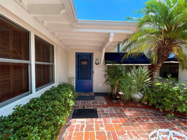 16107 Gulf Blvd, Redington Beach, FL 33708 - property entrance with stucco siding