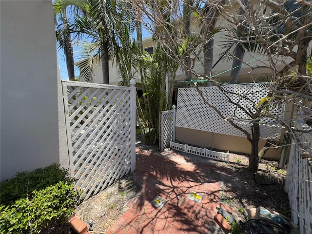 16107 Gulf Blvd, Redington Beach, FL 33708 - view of side of property featuring stucco siding