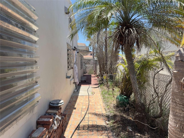16107 Gulf Blvd, Redington Beach, FL 33708 - view of side of home with stucco siding