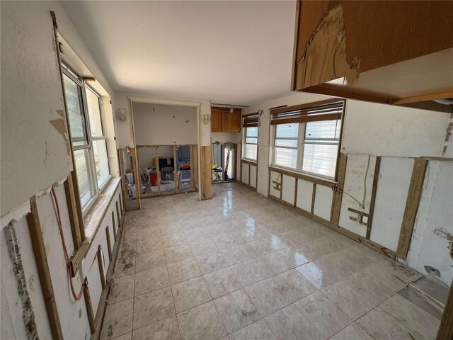 16107 Gulf Blvd, Redington Beach, FL 33708 - unfurnished living room featuring healthy amount of natural light