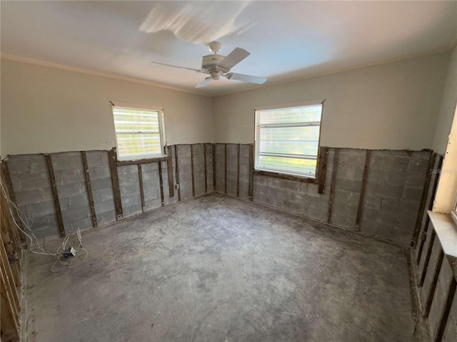 16107 Gulf Blvd, Redington Beach, FL 33708 - unfurnished room featuring unfinished concrete floors, ceiling fan, and ornamental molding