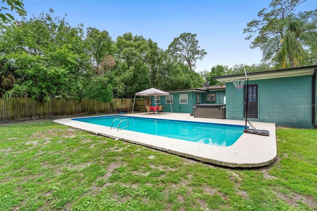 1805 Paloma Ave, Sanford, FL 32771 - view of swimming pool with a patio area, a fenced backyard, and a hot tub