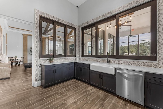 6615 Leo Ln, Saint Cloud, FL 34773 - bar with dishwasher, a sink, a ceiling fan, and dark wood-style flooring