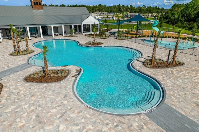 6615 Leo Ln, Saint Cloud, FL 34773 - community pool featuring a patio