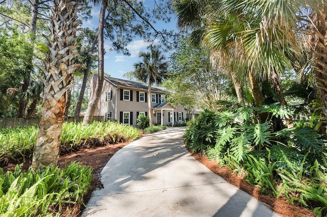 6321 Quarterhorse Cir, Cocoa, FL 32926 - colonial-style house featuring driveway