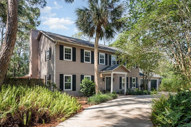 6321 Quarterhorse Cir, Cocoa, FL 32926 - colonial-style house featuring driveway