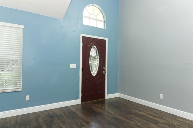 5165 Mystic Point Ct, Orlando, FL 32812 - entryway featuring baseboards and dark wood-type flooring