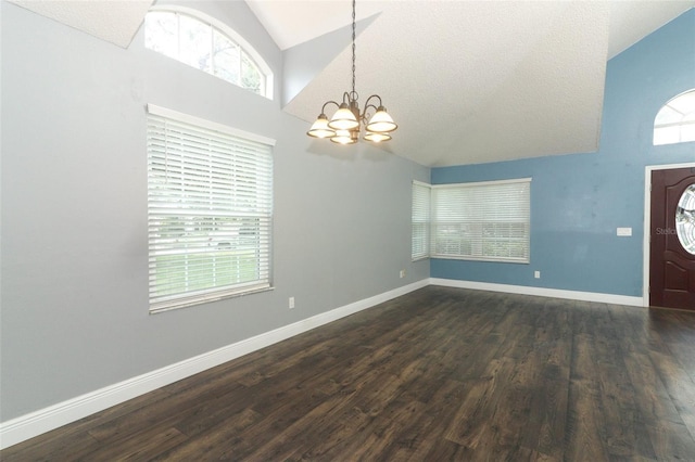 5165 Mystic Point Ct, Orlando, FL 32812 - entrance foyer with a chandelier, dark wood-style floors, high vaulted ceiling, and baseboards