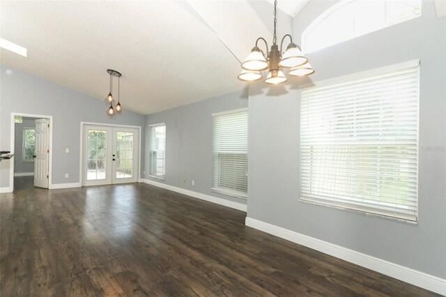 5165 Mystic Point Ct, Orlando, FL 32812 - unfurnished living room with a chandelier, french doors, baseboards, dark wood-style floors, and high vaulted ceiling