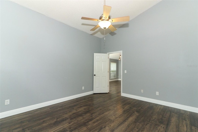 5165 Mystic Point Ct, Orlando, FL 32812 - spare room with baseboards, dark wood-type flooring, high vaulted ceiling, and a ceiling fan