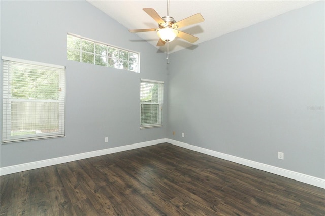 5165 Mystic Point Ct, Orlando, FL 32812 - empty room with a ceiling fan, high vaulted ceiling, dark wood-style flooring, and baseboards