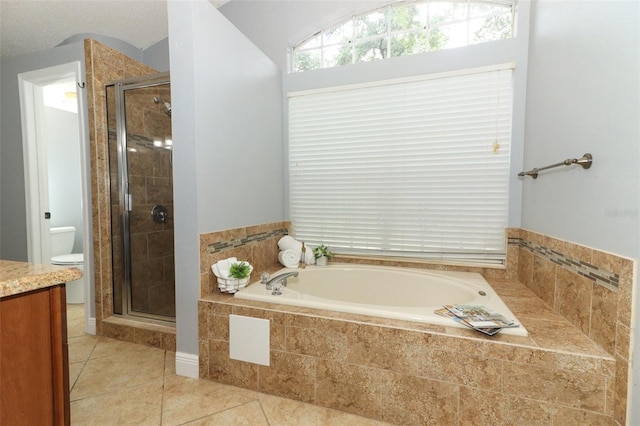 5165 Mystic Point Ct, Orlando, FL 32812 - full bathroom with a bath, a shower stall, vanity, and tile patterned flooring