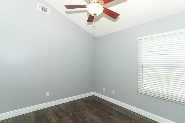 5165 Mystic Point Ct, Orlando, FL 32812 - unfurnished room featuring dark wood-type flooring, baseboards, vaulted ceiling, and ceiling fan