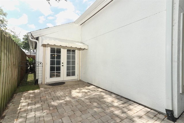 5165 Mystic Point Ct, Orlando, FL 32812 - view of patio with french doors