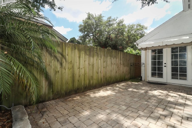5165 Mystic Point Ct, Orlando, FL 32812 - view of patio with french doors