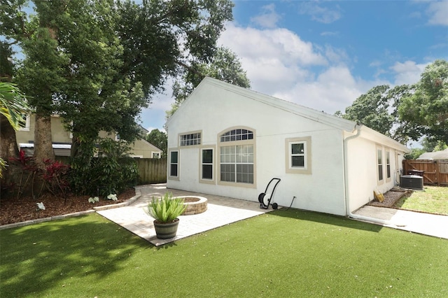 5165 Mystic Point Ct, Orlando, FL 32812 - back of house with a patio, stucco siding, and central AC