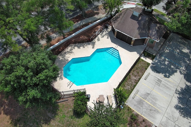 5165 Mystic Point Ct, Orlando, FL 32812 - view of swimming pool featuring a fenced backyard and a patio area