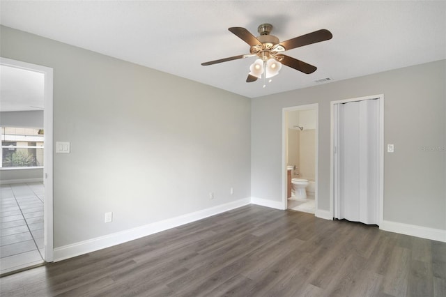 4870 S Semoran Blvd Unit 1905, Orlando, FL 32822 - unfurnished bedroom featuring wood finished floors and baseboards