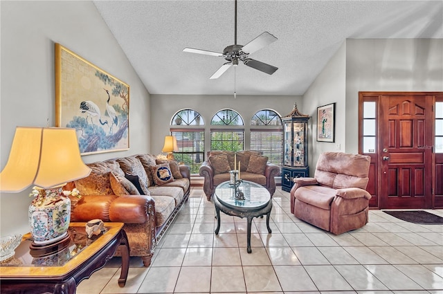 2209 Fairglenn Way, Winter Park, FL 32792 - living area featuring vaulted ceiling, a ceiling fan, light tile patterned floors, and a textured ceiling