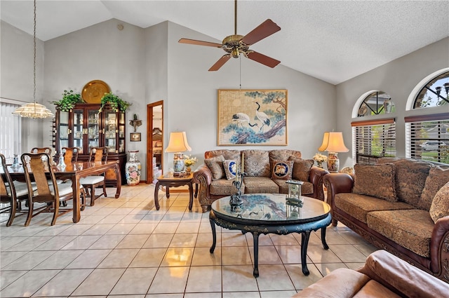 2209 Fairglenn Way, Winter Park, FL 32792 - living area with light tile patterned flooring, a ceiling fan, and high vaulted ceiling