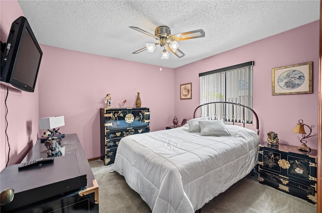 2209 Fairglenn Way, Winter Park, FL 32792 - carpeted bedroom with a ceiling fan and a textured ceiling