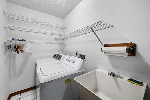 2209 Fairglenn Way, Winter Park, FL 32792 - washroom with washer and dryer and a textured ceiling