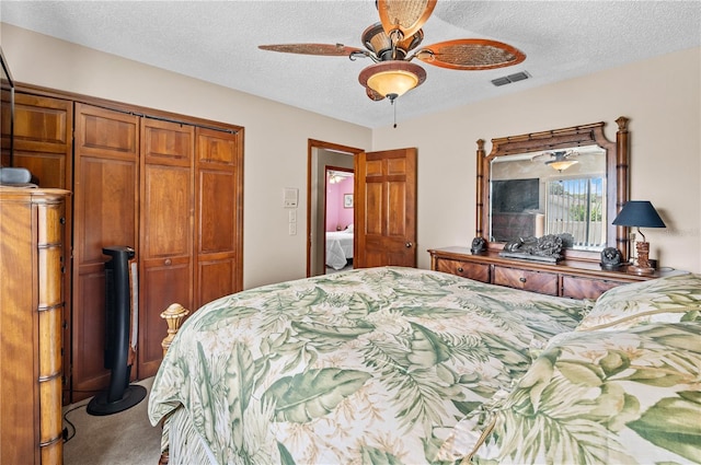 2209 Fairglenn Way, Winter Park, FL 32792 - bedroom with carpet floors, a textured ceiling, a closet, and ceiling fan