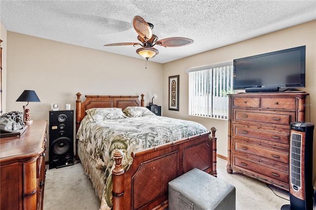 2209 Fairglenn Way, Winter Park, FL 32792 - bedroom featuring light carpet, a ceiling fan, and a textured ceiling