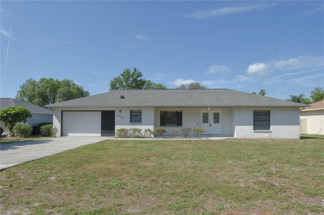 1668 Fort Smith Blvd, Deltona, FL 32725 - ranch-style home with driveway, an attached garage, brick siding, and a front yard