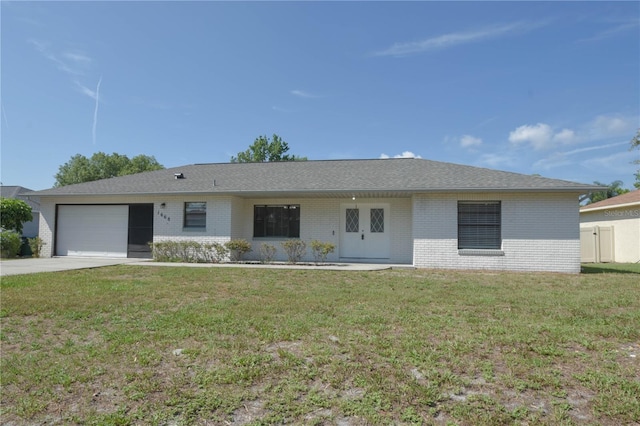 1668 Fort Smith Blvd, Deltona, FL 32725 - ranch-style home featuring brick siding, an attached garage, a front lawn, and concrete driveway