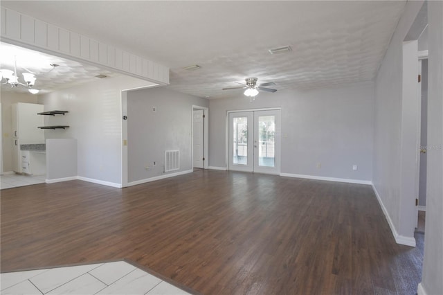 1668 Fort Smith Blvd, Deltona, FL 32725 - unfurnished living room featuring wood finished floors, a chandelier, a ceiling fan, and baseboards