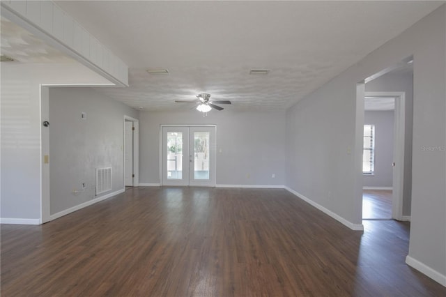 1668 Fort Smith Blvd, Deltona, FL 32725 - unfurnished room with healthy amount of natural light, a ceiling fan, dark wood-style floors, and baseboards