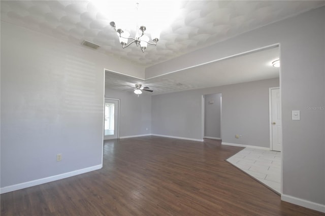 1668 Fort Smith Blvd, Deltona, FL 32725 - spare room with wood finished floors, a chandelier, baseboards, and ceiling fan