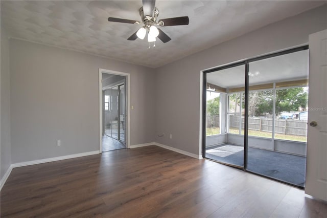 1668 Fort Smith Blvd, Deltona, FL 32725 - spare room featuring wood finished floors, a ceiling fan, and baseboards