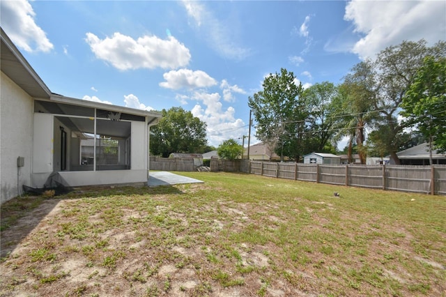 1668 Fort Smith Blvd, Deltona, FL 32725 - view of yard featuring a sunroom and a patio